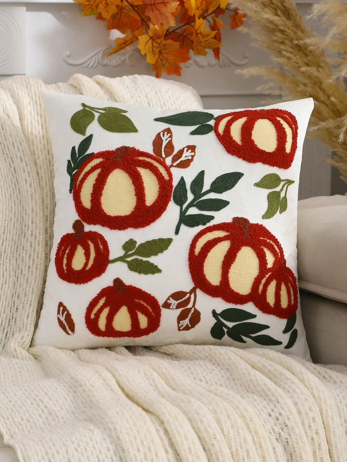 Design C: Red Pumpkin Patch - bold red outline pumpkins with cream centers and green leaf accents on white pillow cover