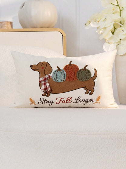 Stay Fall Longer tufted embroidered dachshund lumbar cushion cover on white bed with three pumpkins and plaid scarf detail