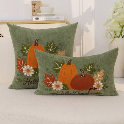 Hello Pumpkin embroidered cushion covers in cream - square and lumbar sizes on white sofa in bright neutral room