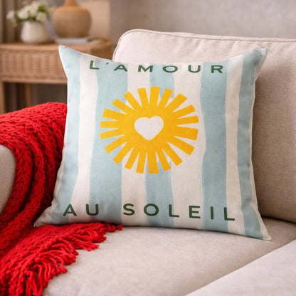 L'Amour Au Soleil pillow cover with sunshine heart motif and coastal striped background
