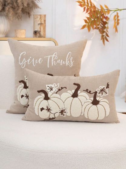 Give Thanks embroidered pumpkin pillow cover set in natural linen on white sofa - square and lumbar