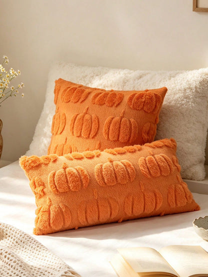 Pumpkin orange plush faux fur scallop pumpkin bobble pillow covers in square and lumbar sizes on white bed