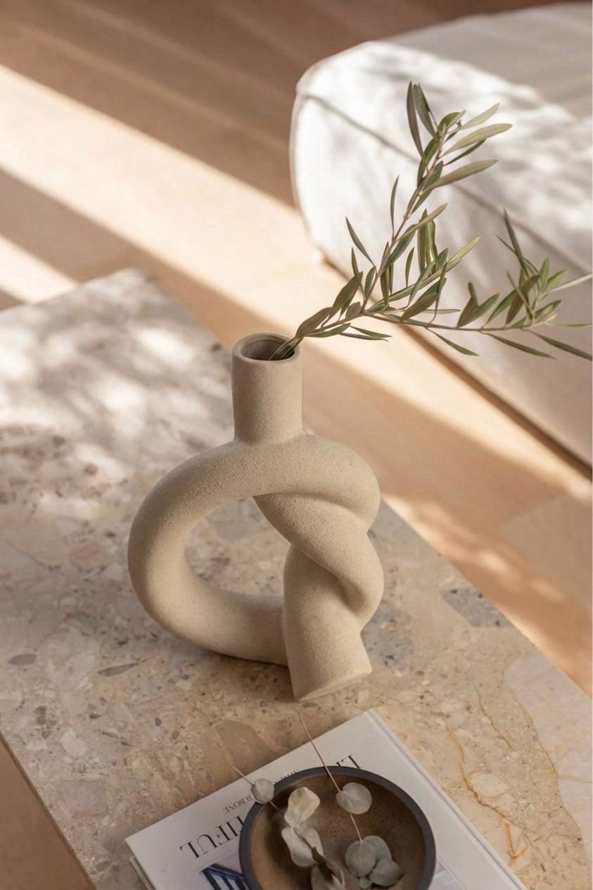 Modern beige vase with unique shape for aesthetic home decor
