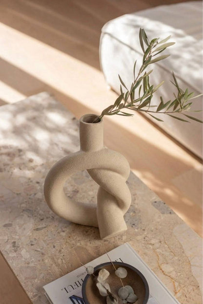 Modern beige vase with unique shape for aesthetic home decor